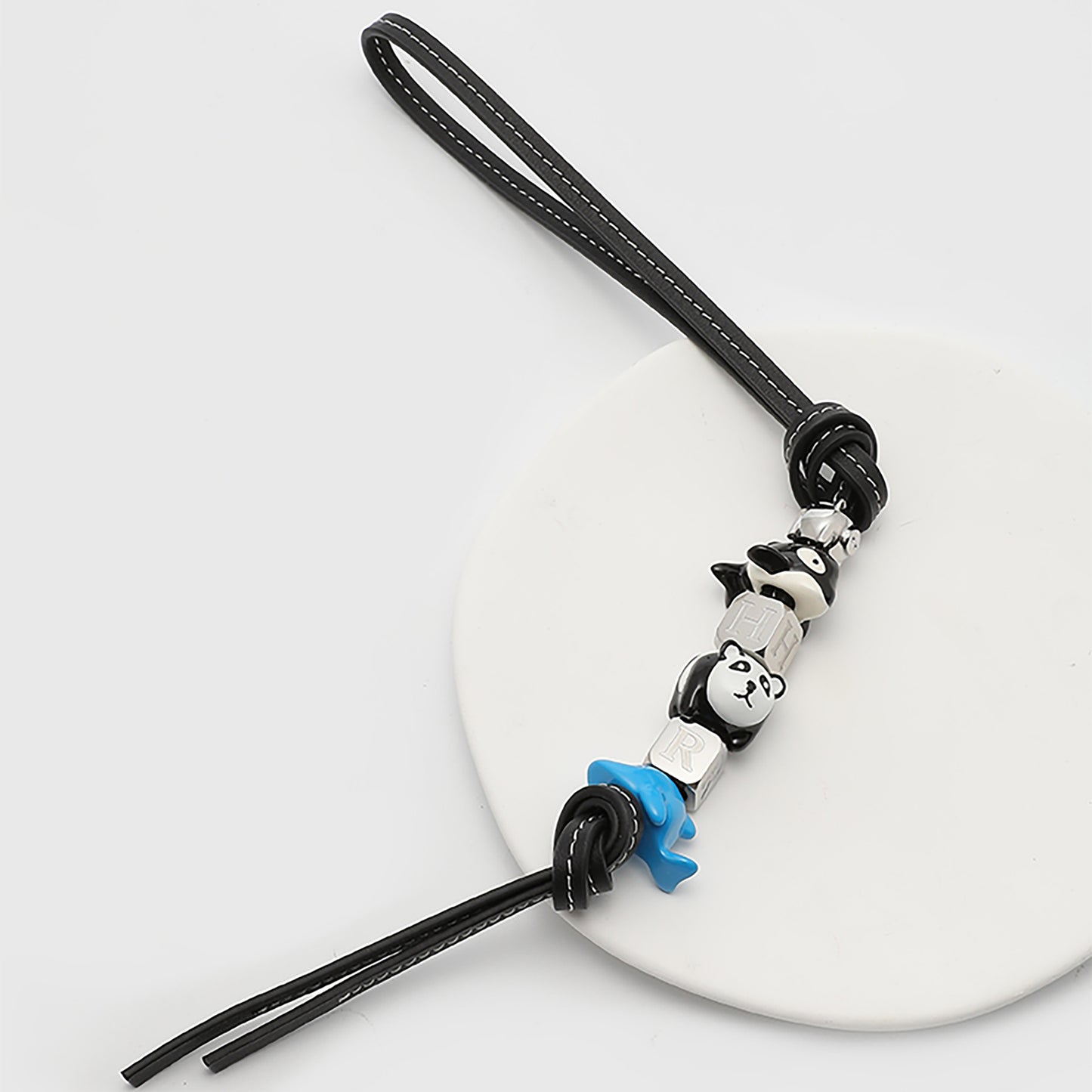 Fashionable bag charm made of genuine leather, featuring a cute animal design, perfect as a decorative accessory for your handbag