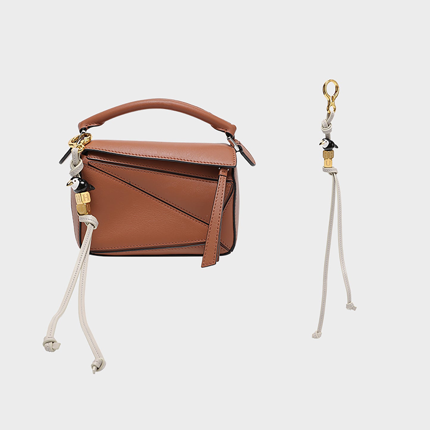 Fashionable bag charm made of genuine leather, featuring a cute animal design, perfect as a decorative accessory for your handbag