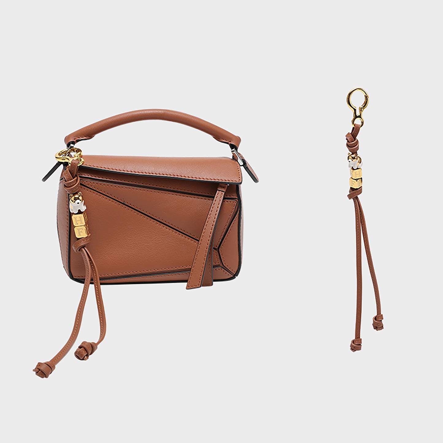 Fashionable bag charm made of genuine leather, featuring a cute animal design, perfect as a decorative accessory for your handbag