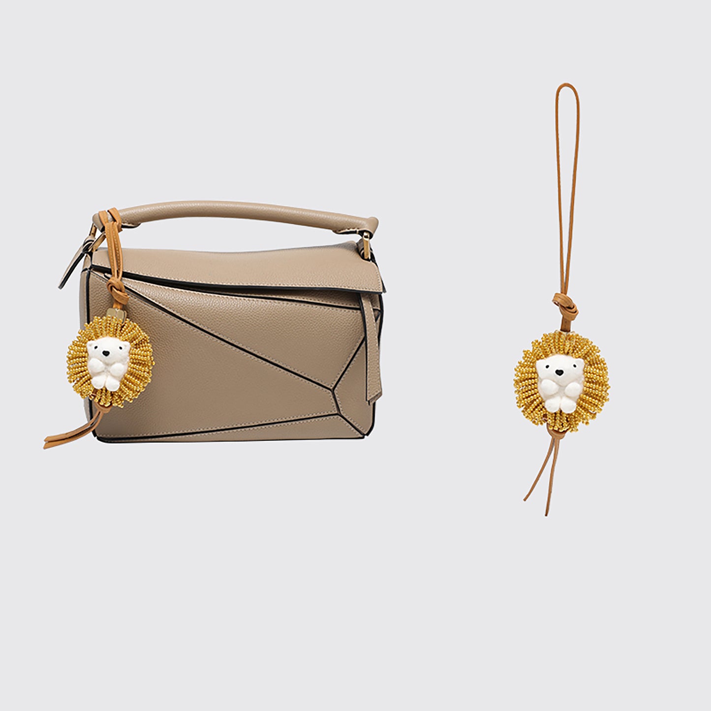 A fashionable handbag charm, handmade from genuine leather, featuring a cute animal design. It can be used as a keychain or a car accessory