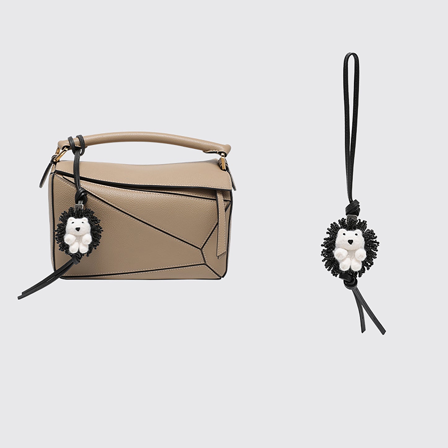 A fashionable handbag charm, handmade from genuine leather, featuring a cute animal design. It can be used as a keychain or a car accessory