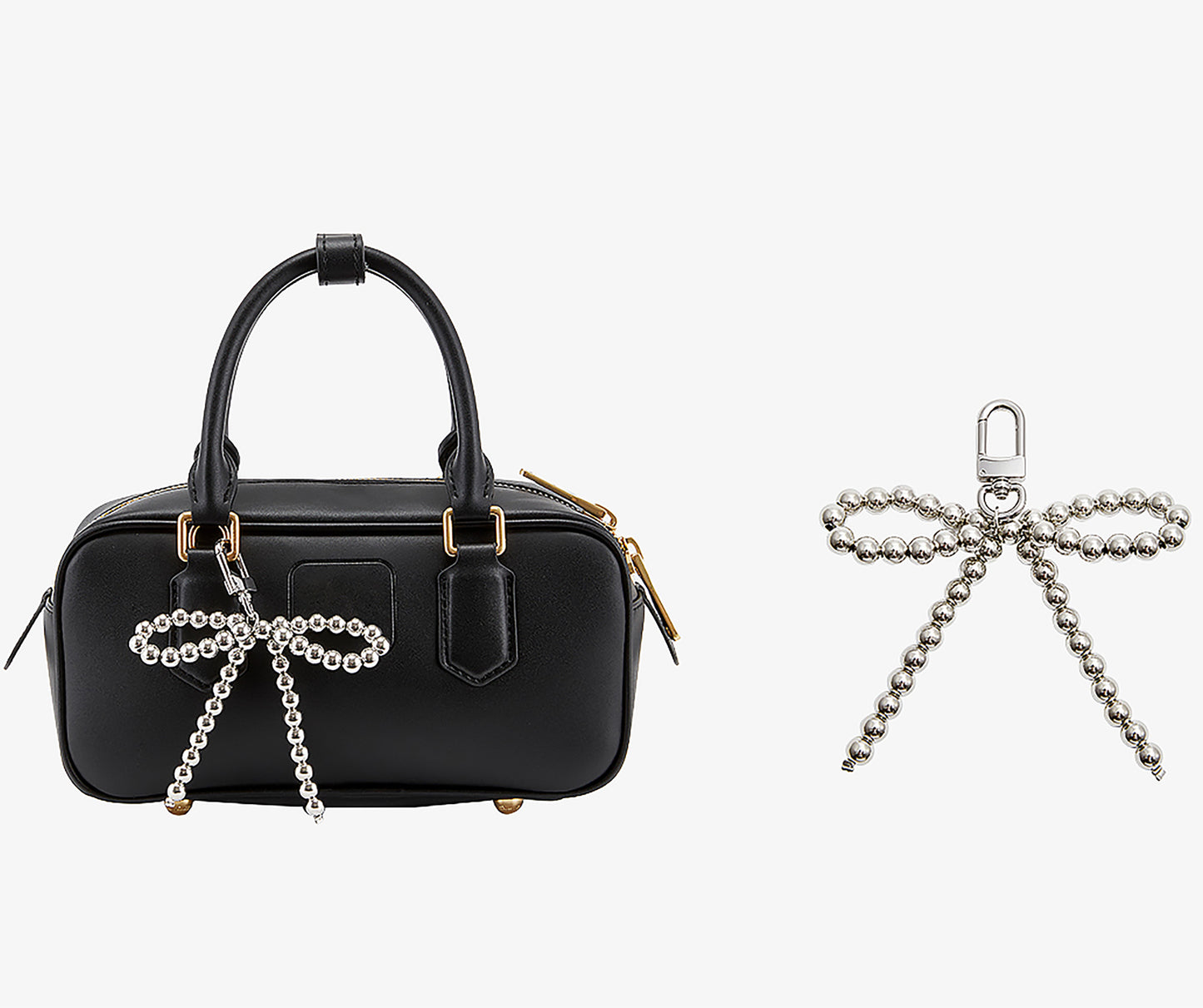 Arcadie matelassé nappa leather bag charm, pearl decorative accessory, bow-shaped keychain.