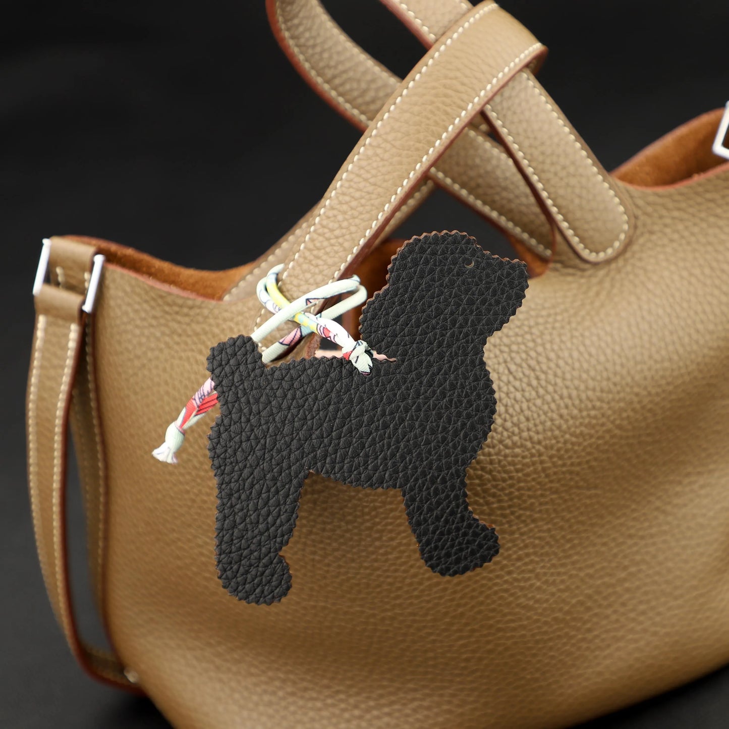 Smiling Cute Poodle Dog bag charm,one side in epsom leather , other side in togo leather ,Leather bag charm, Handmade leather bag charm