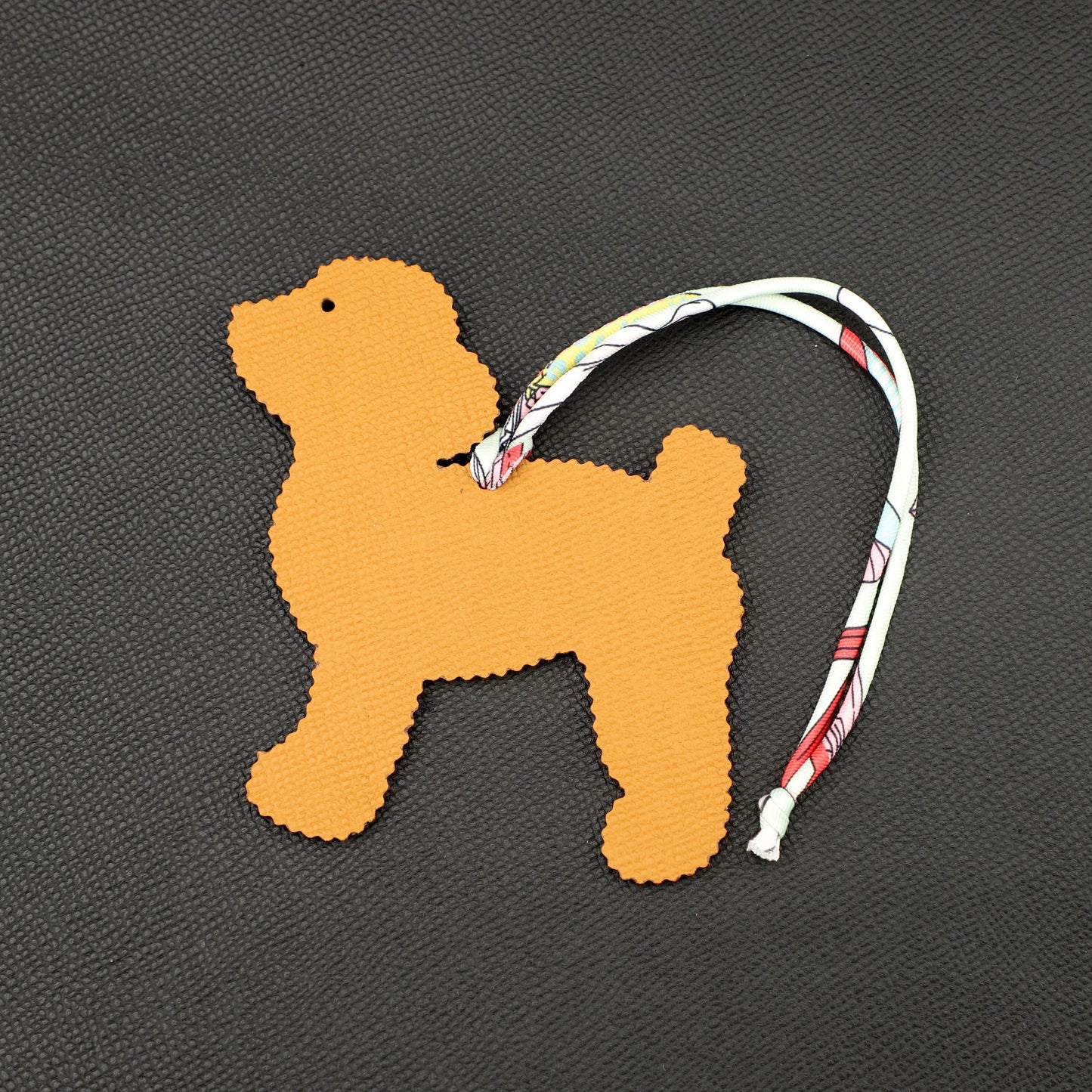 Smiling Cute Poodle Dog bag charm,one side in epsom leather , other side in togo leather ,Leather bag charm, Handmade leather bag charm