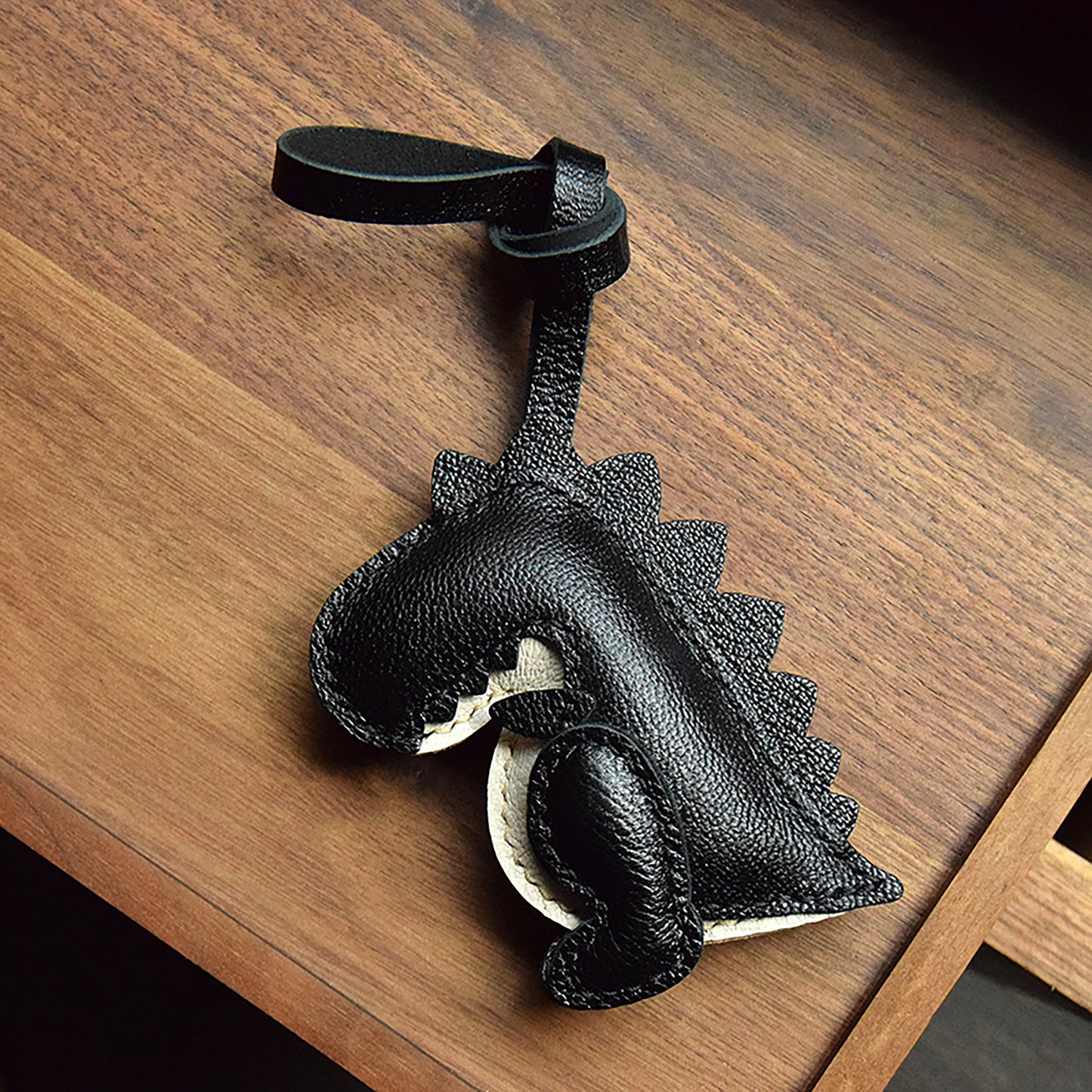 Get This Eye - Catching Dinosaur - Shaped Bag Charm Crafted from 100% Genuine Leather, a Perfect Fit for All Bags