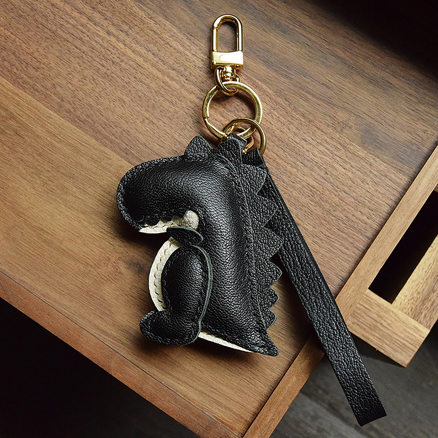 Get This Eye - Catching Dinosaur - Shaped Bag Charm Crafted from 100% Genuine Leather, a Perfect Fit for All Bags