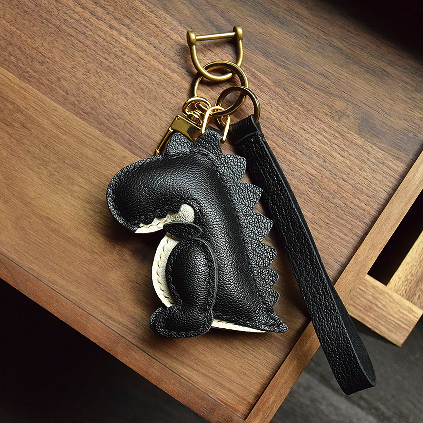 Get This Eye - Catching Dinosaur - Shaped Bag Charm Crafted from 100% Genuine Leather, a Perfect Fit for All Bags