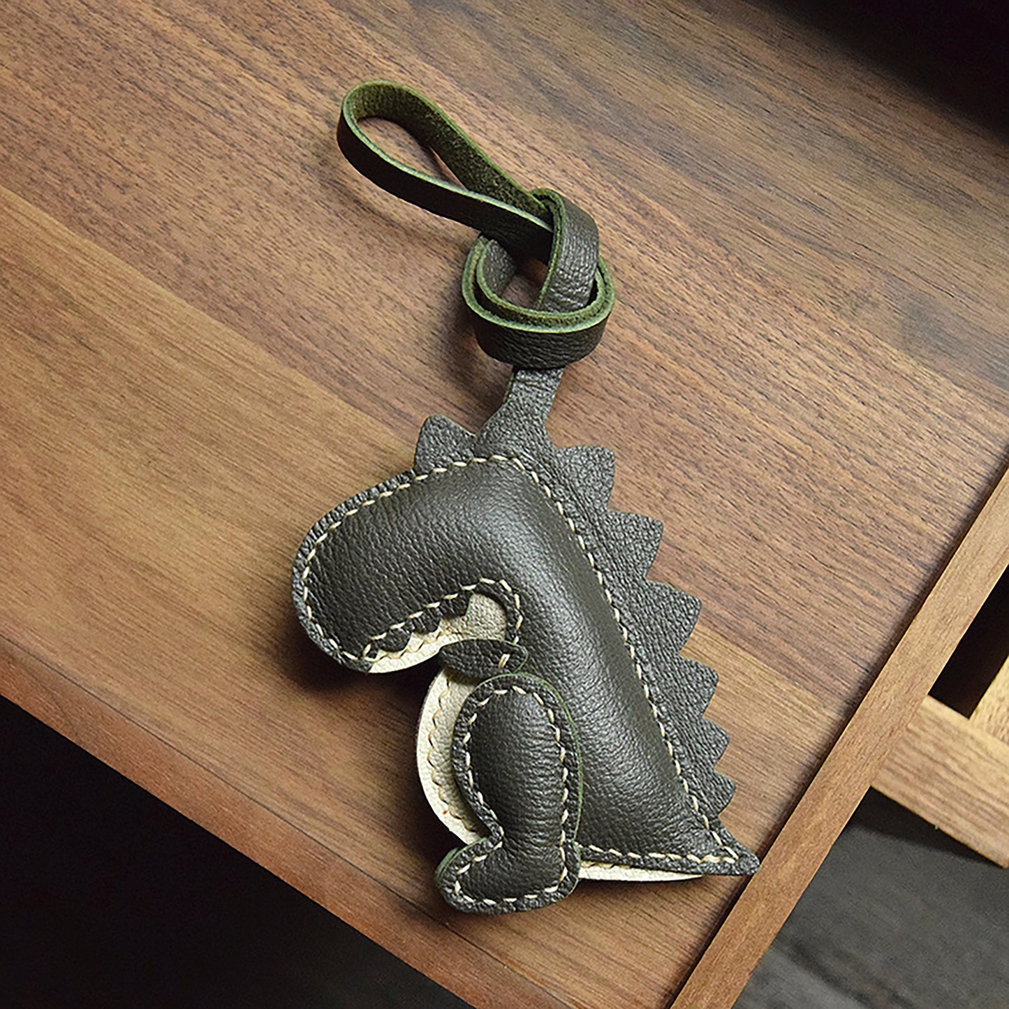 Get This Eye - Catching Dinosaur - Shaped Bag Charm Crafted from 100% Genuine Leather, a Perfect Fit for All Bags
