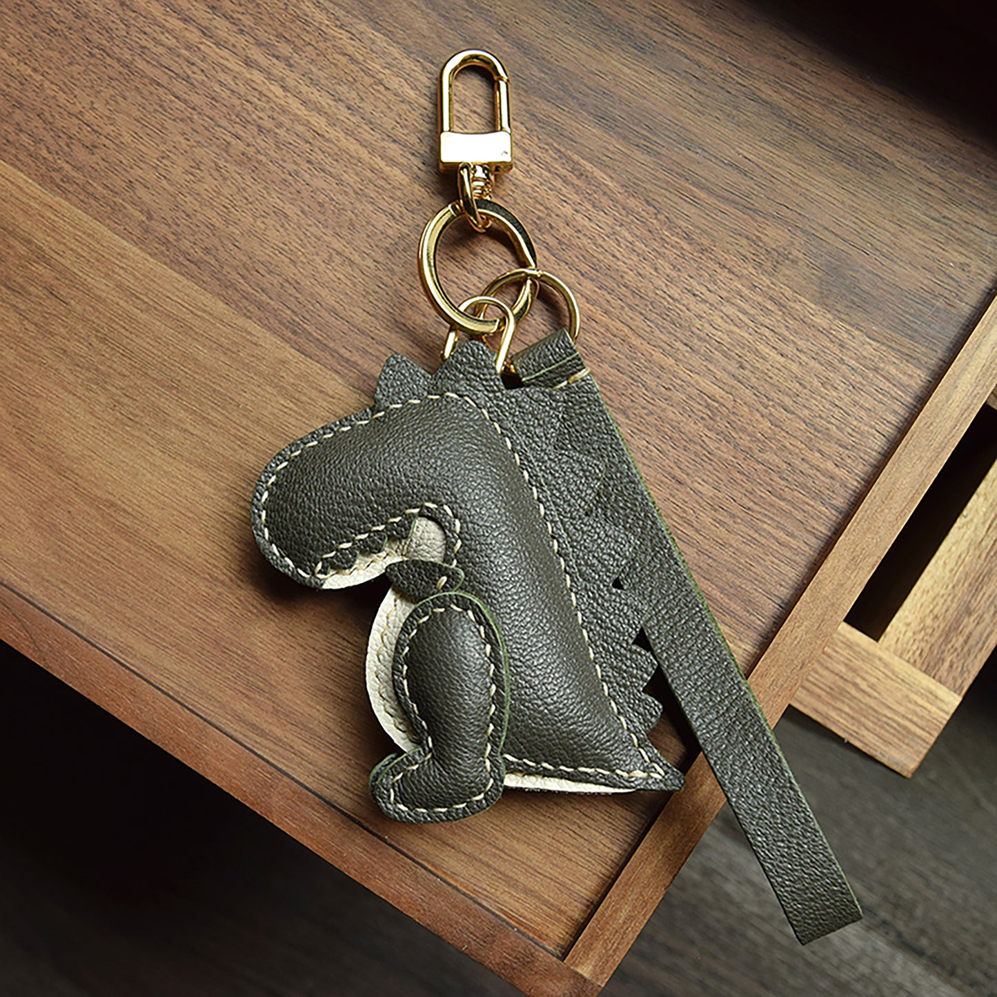 Get This Eye - Catching Dinosaur - Shaped Bag Charm Crafted from 100% Genuine Leather, a Perfect Fit for All Bags