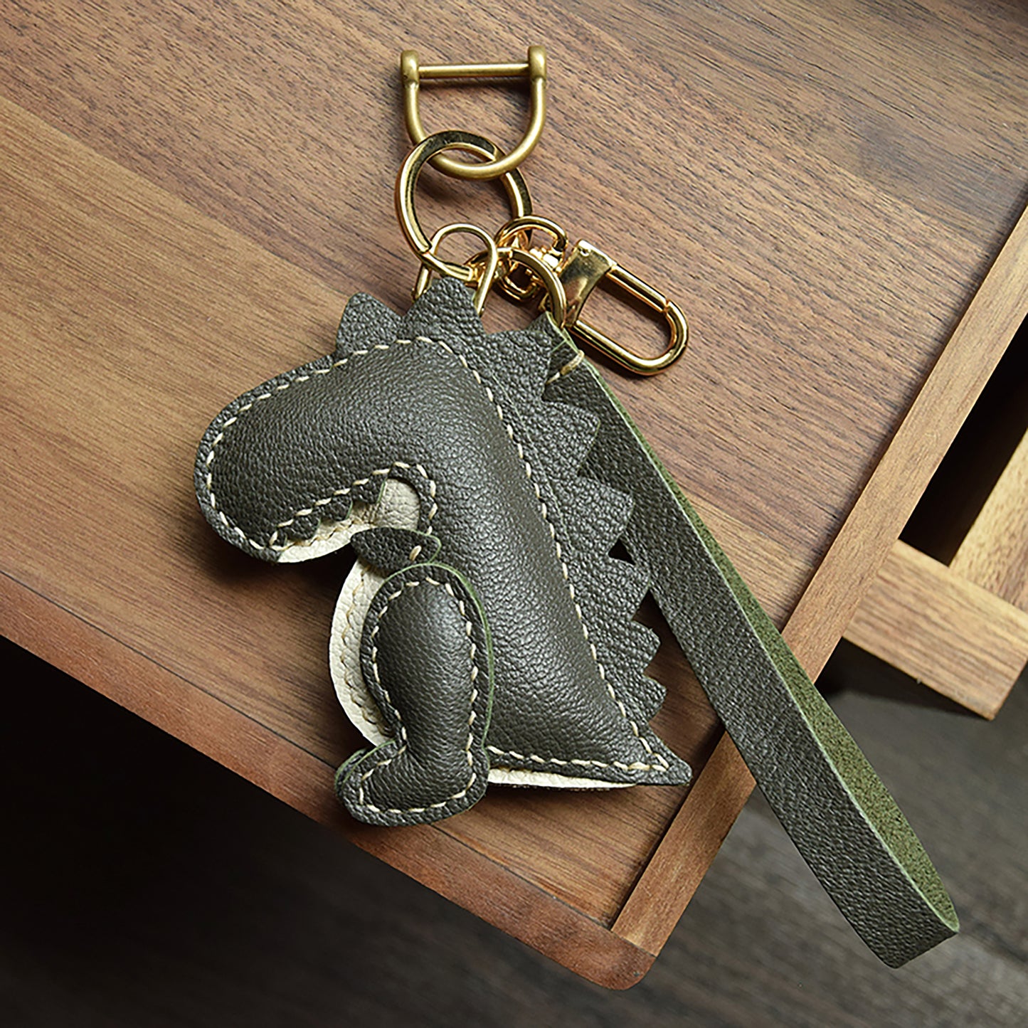 Get This Eye - Catching Dinosaur - Shaped Bag Charm Crafted from 100% Genuine Leather, a Perfect Fit for All Bags