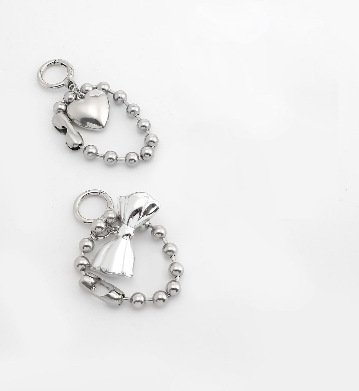 Arcadie leather bag charm, silver bow bag decoration, metal heart-shaped bead keychain